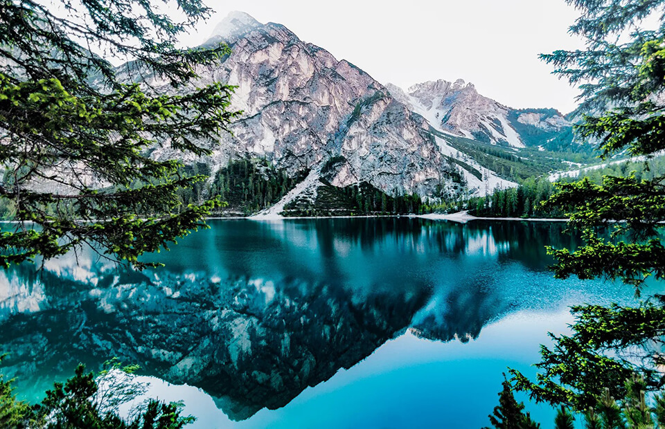 Lake surrounded by mountains will offer you unique experiences