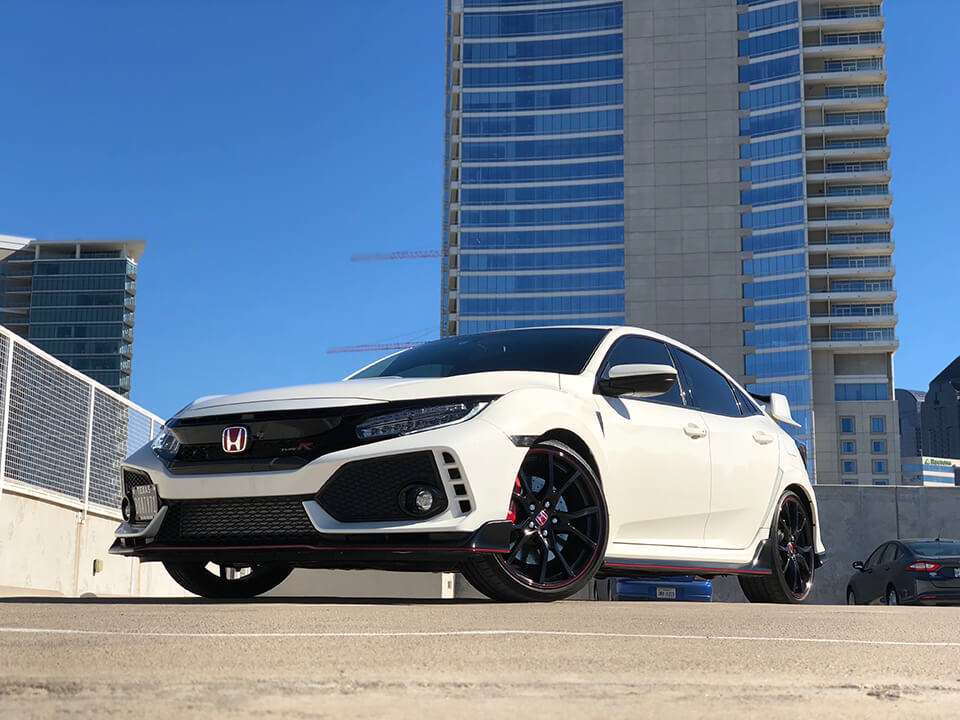 White Honda Civic on the parking lot