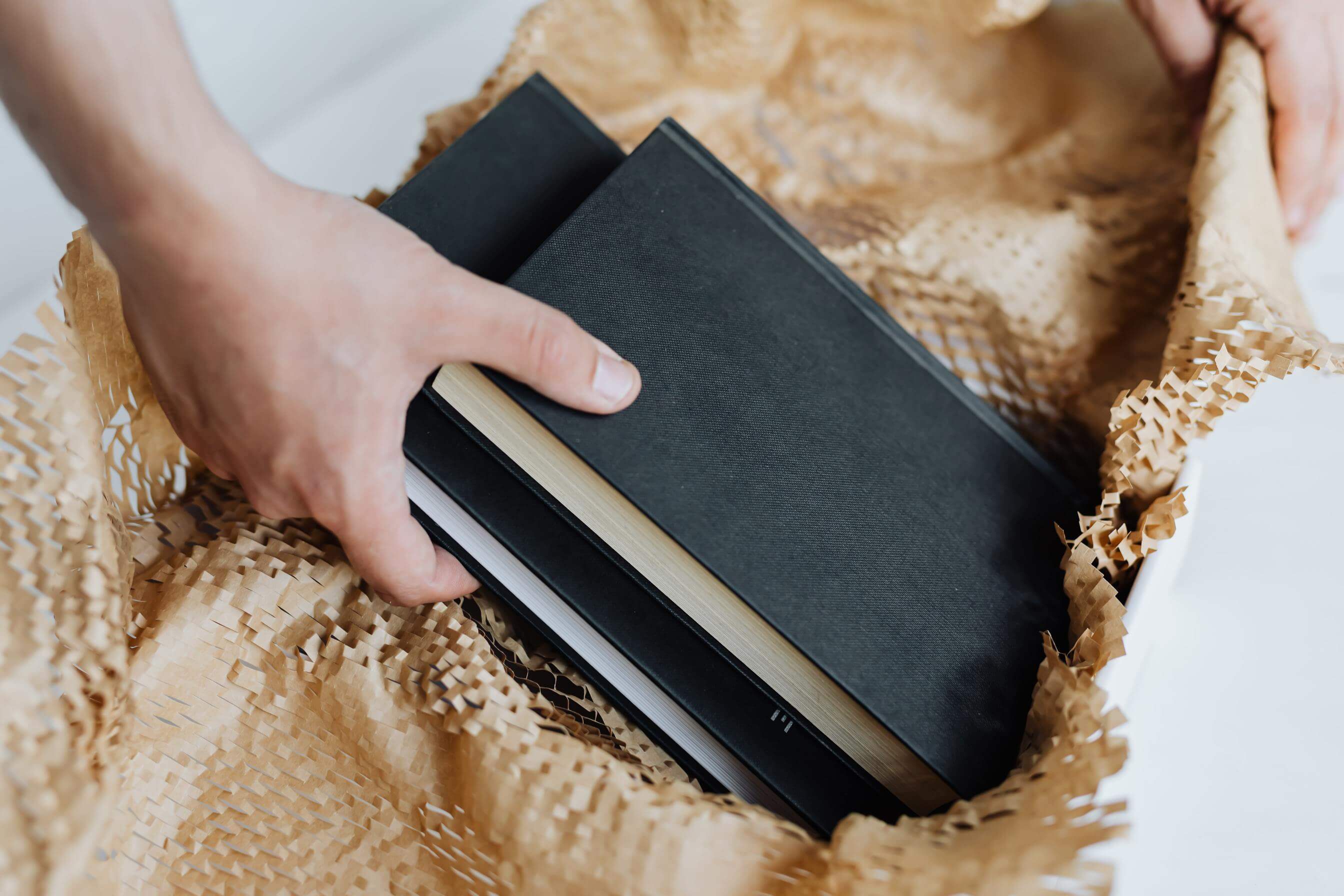 Placing books into a box