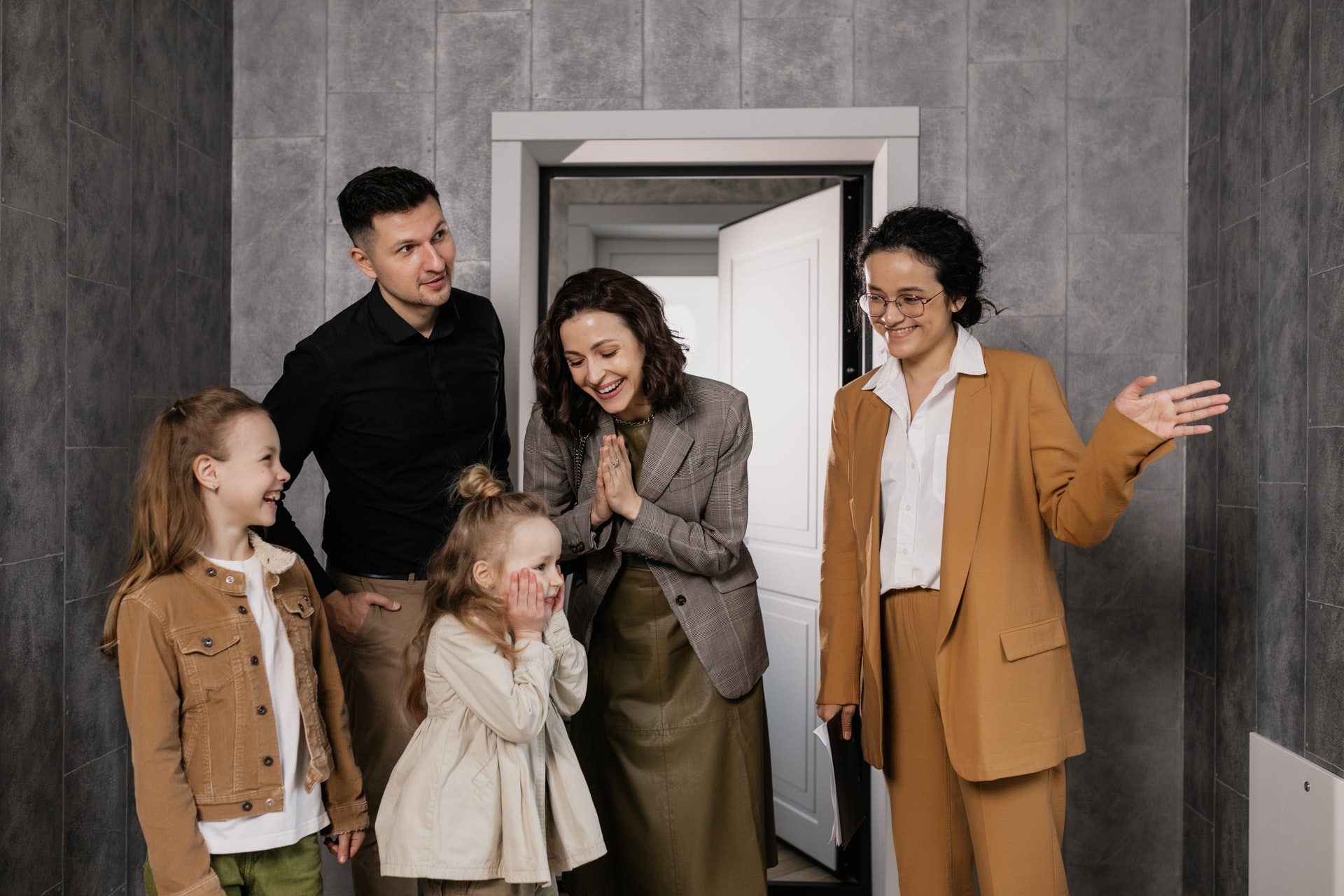 A family with their realtor