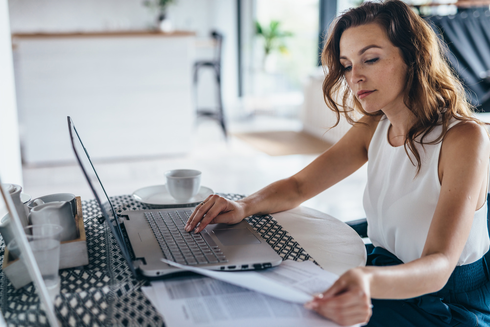 Woman typing on the laptop