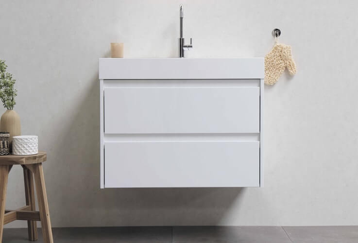 A floating bathroom cabinet with possible storage space beneath