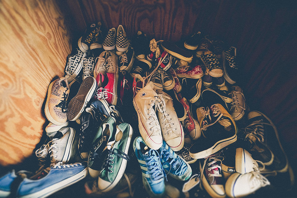 Footwear piled up for a moving company to relocate