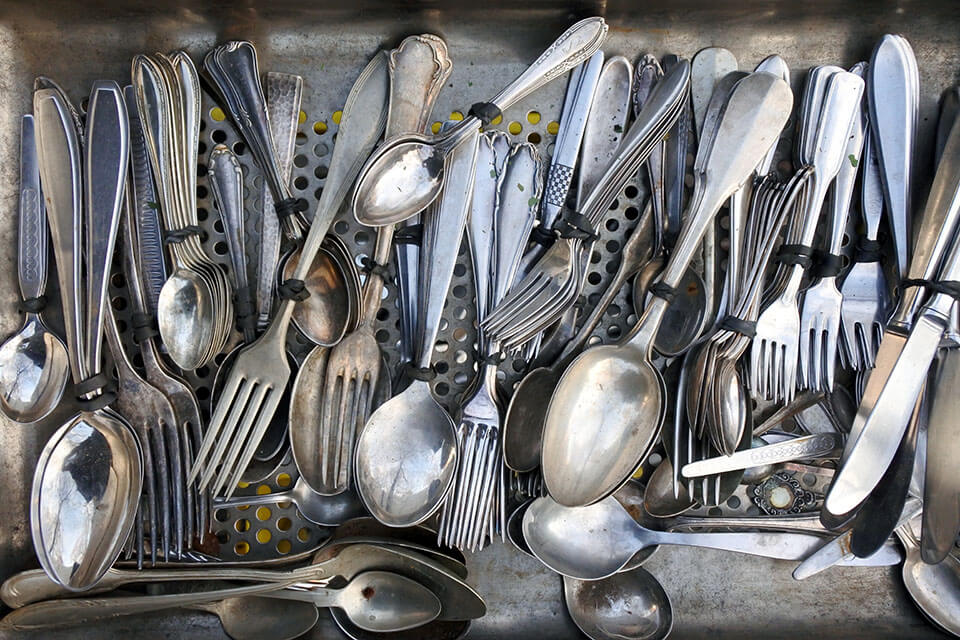 Pile of forks and spoons