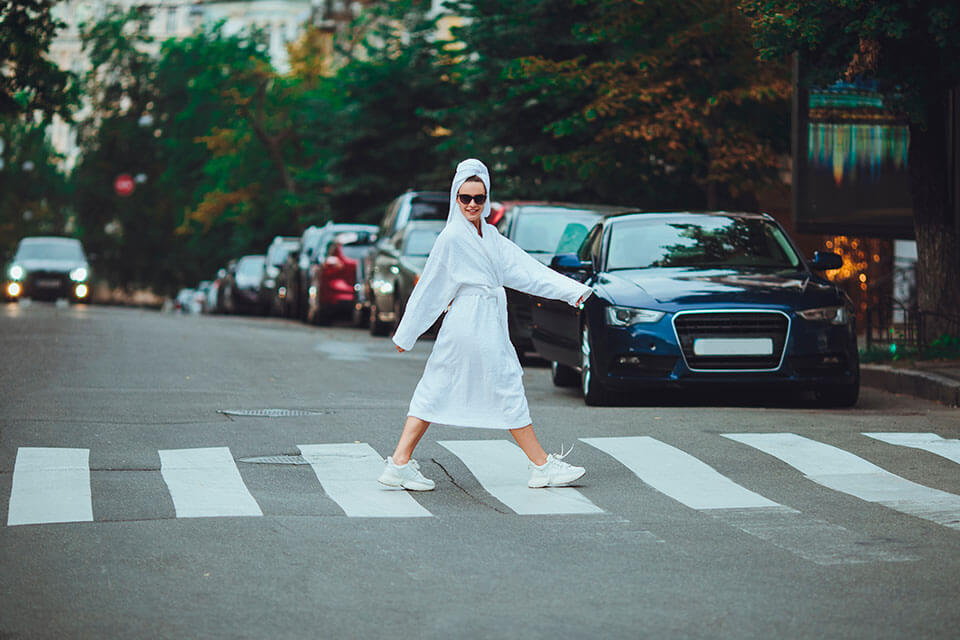 Girl in the street in a bathing suit